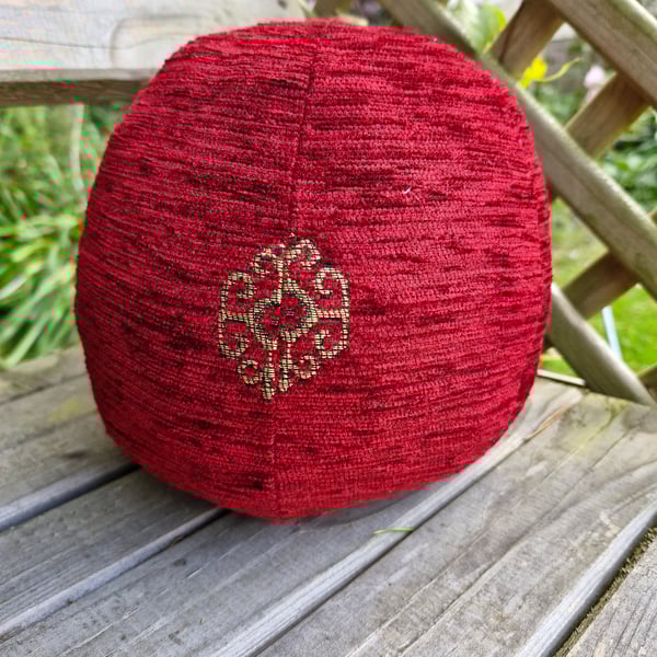Large, decorative, christmas, red and gold fabric bauble ball.