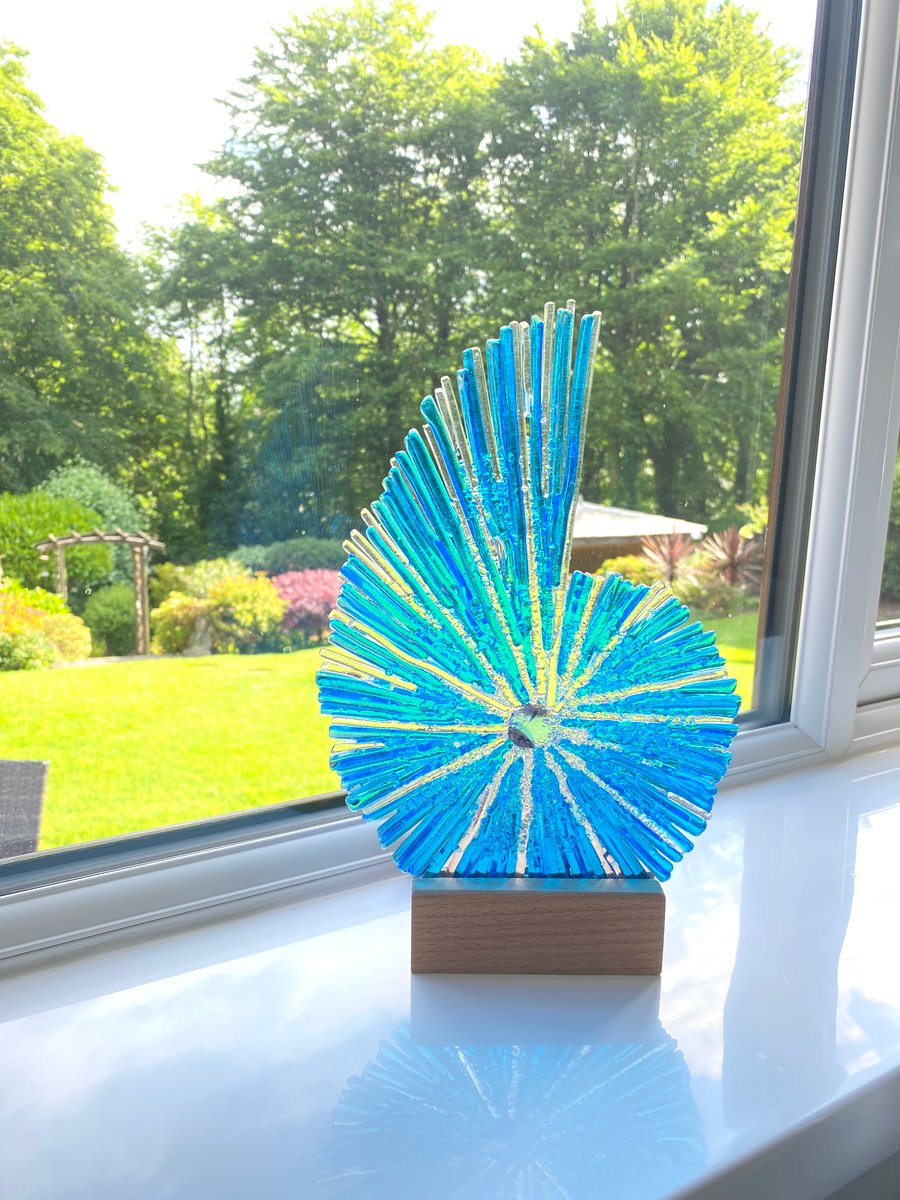 Fused glass ammonite sculpture