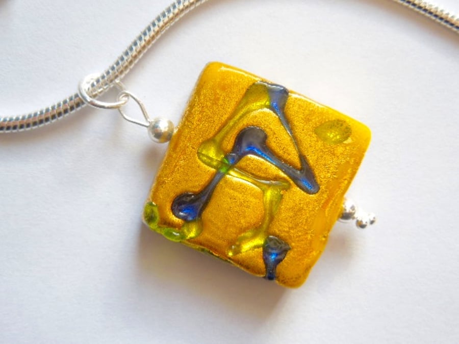  Murano glass gold square pendant with sterling silver snake chain.