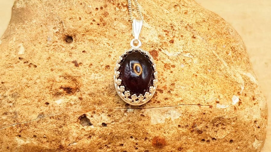 Small oval Garnet pendant. January Birthstone