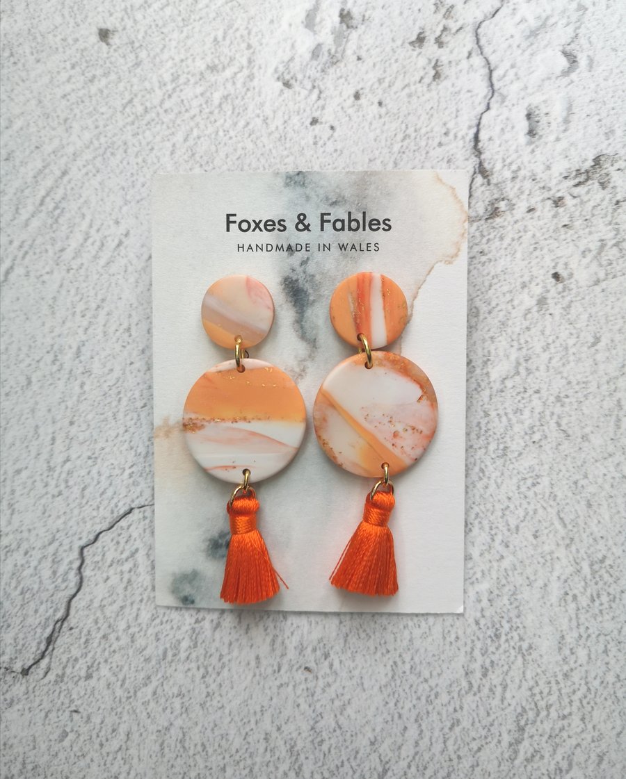 Peach Melba Collection Round Earrings with Orange Tassles