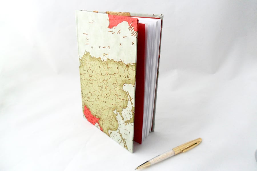 Notebook covered in a maps fabric