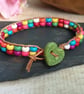 Multicoloured howlite bead and leather bracelet with green ceramic heart button - Image 5