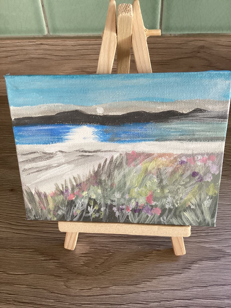 Small colourful paintings with easel 