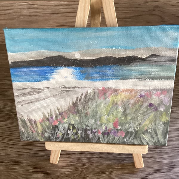 Small colourful paintings with easel 