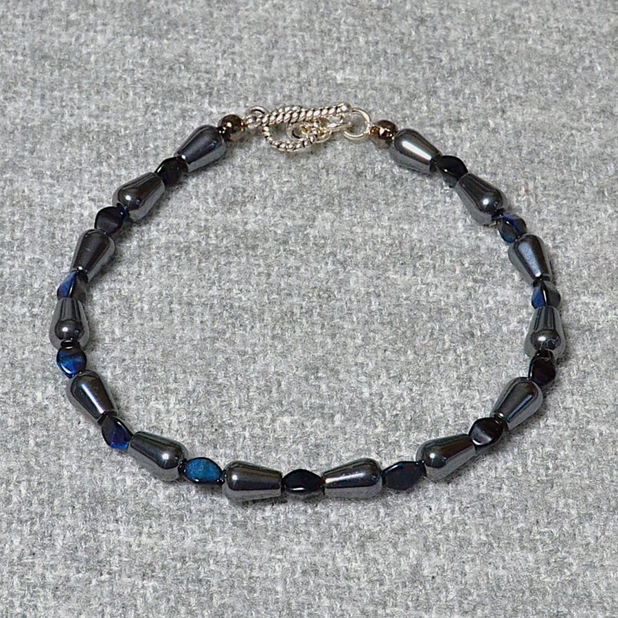 Hematite Drop Bead and Blue Pinch Bead Unisex Bracelet 