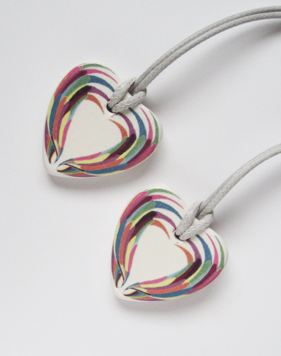 Multicolour Wing Design Heart Shaped Ceramic Pendant on Grey Cord