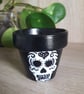 Pair of small terracotta plant pots hand drawn with decorative skulls.   - Image 2