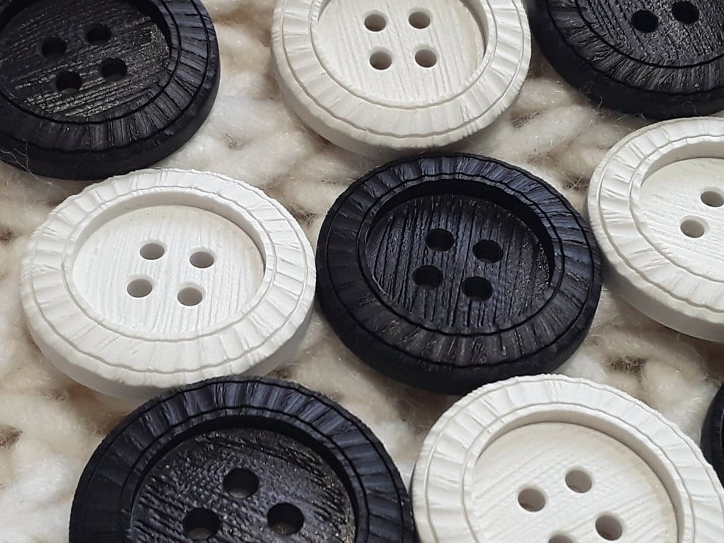 Vintage Casein 54L,  34.5mm   1 & 3 8" Undyed and Black Buttons