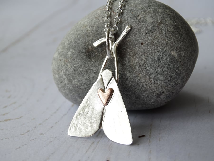 Midsummer moth with heart in recycled silver