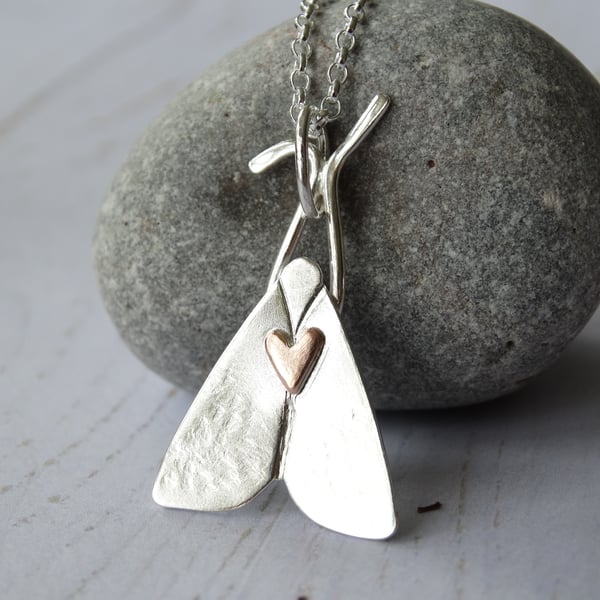 Midsummer moth with heart in recycled silver