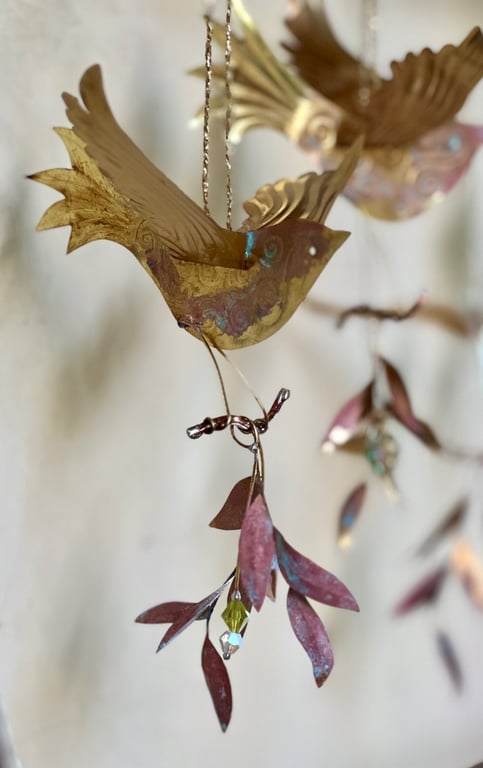 Brass bird hanger