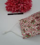 Face mask,  small, 3 layer, adjustable, washable in pink and white flowers.  - Image 8
