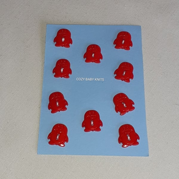 RED PENGUIN SHAPED BUTTONS WITH TWO HOLES FOR ATTACHING 