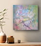 April Shimmers is a painting of an apple blossom tree by a river in spring