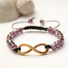 Infinity bracelet with purple Chinese crystal faceted rondelles.