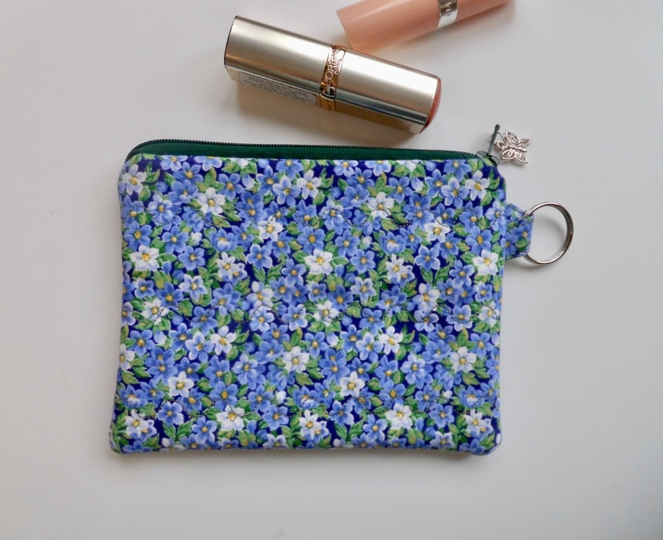 Small makeup bag or large coin purse in floral print