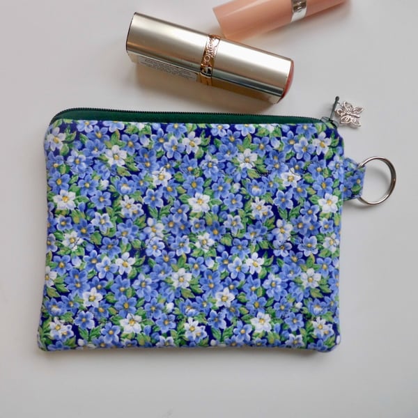 Small makeup bag or large coin purse in floral print