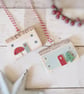 Set of 2 Wooden Festive House Hanging Decorations - Image 1