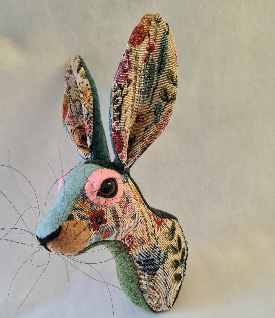 Faux hare head wall mount in floral tapestry fabric