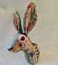 Faux hare head wall mount in floral tapestry fabric