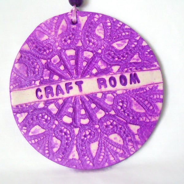 clay craft room sign in purple for hanging from your wall or door