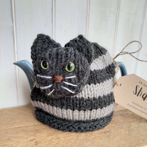 Handknitted cat tea cosy