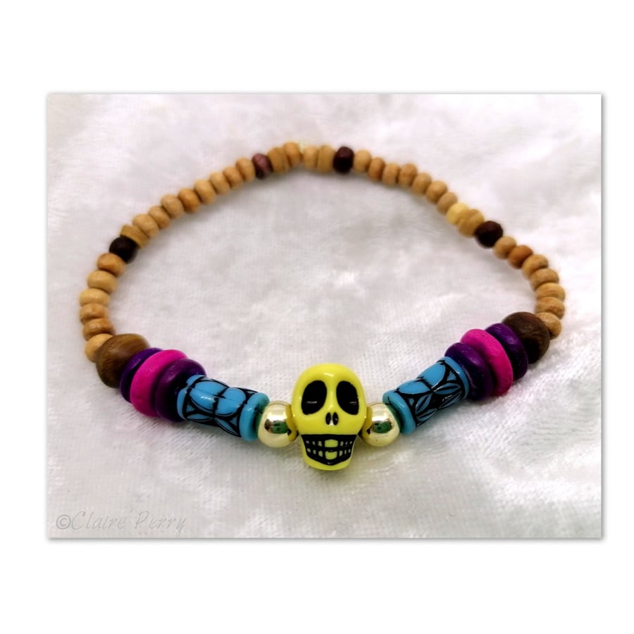 Wooden Surfer's bead bracelet with yellow skull bead.