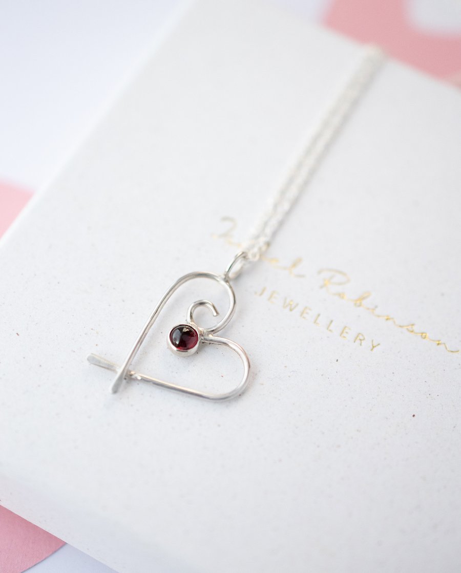 Silver heart pendant necklace