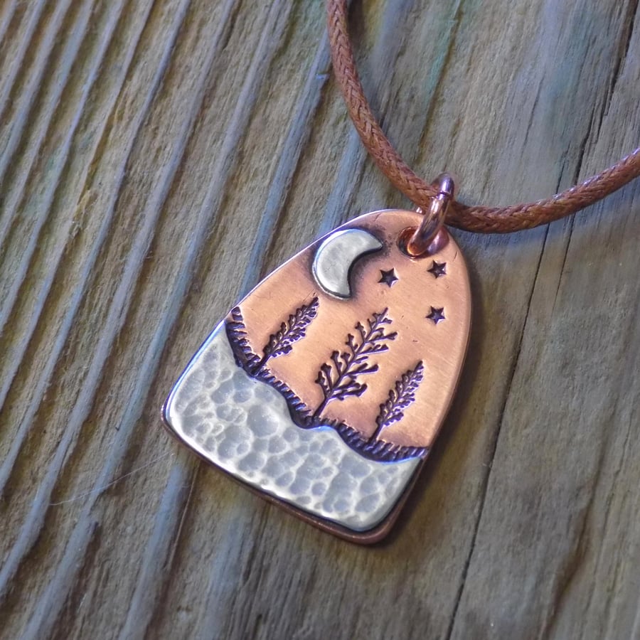 Copper and silver 'winter moon' mixed metals scene pendant 
