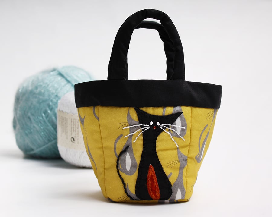 Tiny yellow bag with cat print and cat appliqué