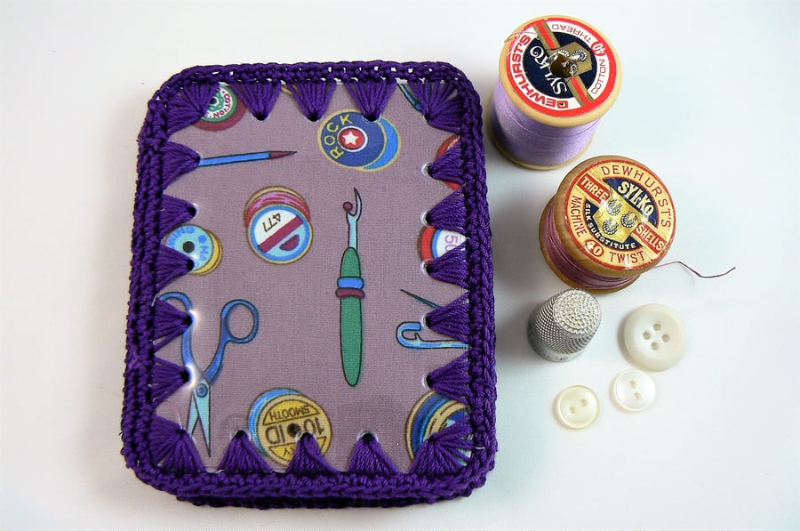 Needle case (purple and lilac crochet and material ) featuring wipe clean cover.