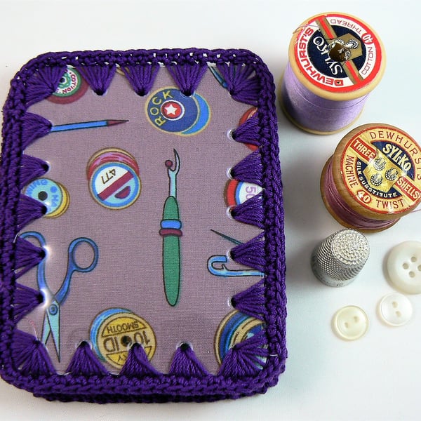 Needle case (purple and lilac crochet and material ) featuring wipe clean cover.