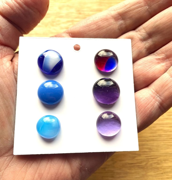 Six fused glass cabachons in blues and lilacs