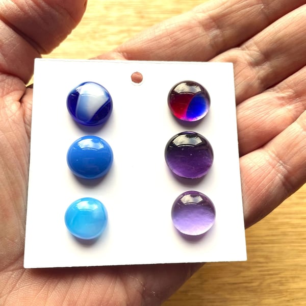 Six fused glass cabachons in blues and lilacs