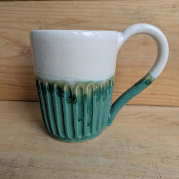 Matte jade green & white carved mug