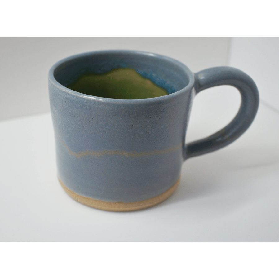 Grey and green two-tone handmade pottery mug 8cm x 9cm approx