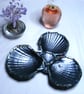 Metallic black scallop shell trinket dish.