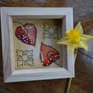 Box framed fabric design using the free motion embroidery technique