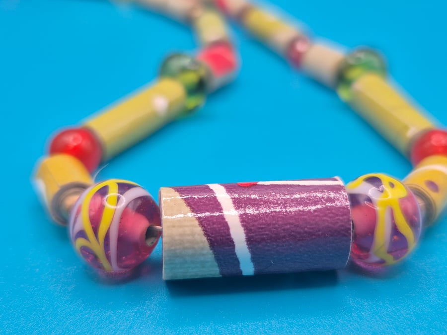 Paper beaded necklace made with wall paper and beautiful coloured glass beads
