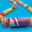 Paper beaded necklace made with wall paper and beautiful coloured glass beads