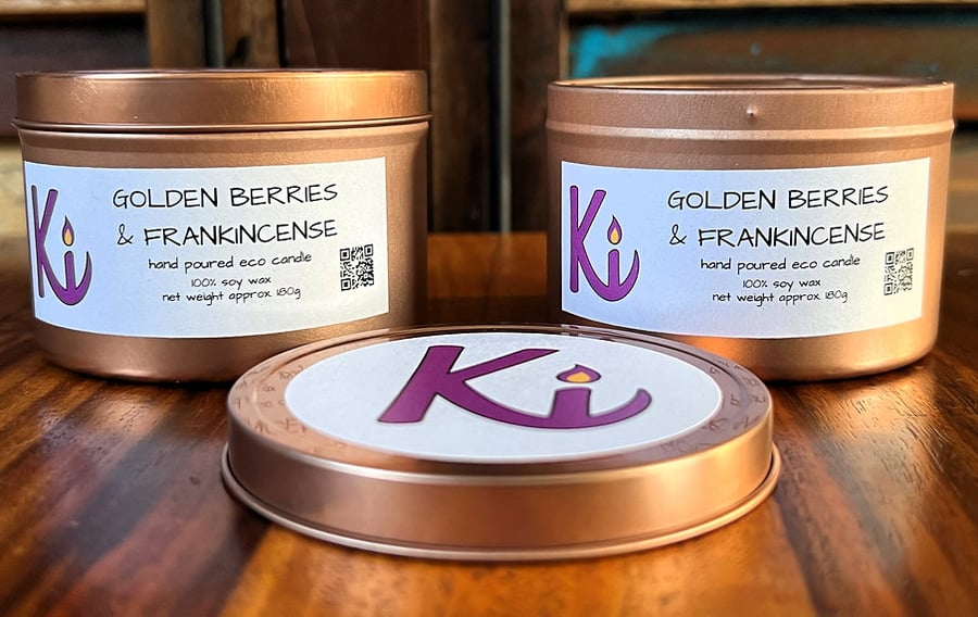 Golden Berries & Frankincense scented soy candle in a rose gold tin