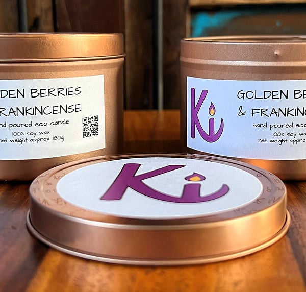 Golden Berries & Frankincense scented soy candle in a rose gold tin