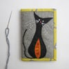 Needle case with mustard cat print appliquéd cat 