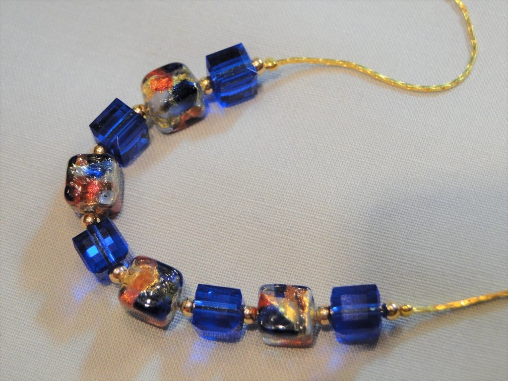 A Crystal Necklace with Swarovski Blue cubes and Murano blue and gold cubes