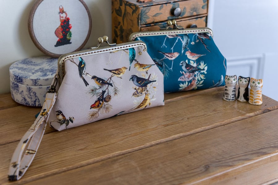 Wristlet purse or small clutch made with pretty digital printed bird lawn