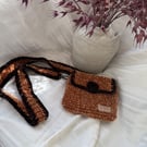 Crocheted cross body bag