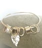 Silver Bangle with Leaf Charm and Spinner Rings, Gift for nature lover - Image 4