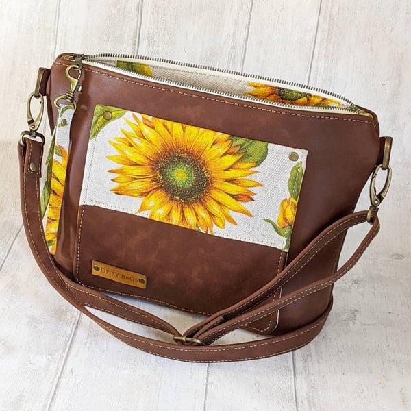 Leather crossbody bag with sunflower design