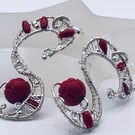 Statement S shaped earrings in carved red gemstones and dyed coral beads